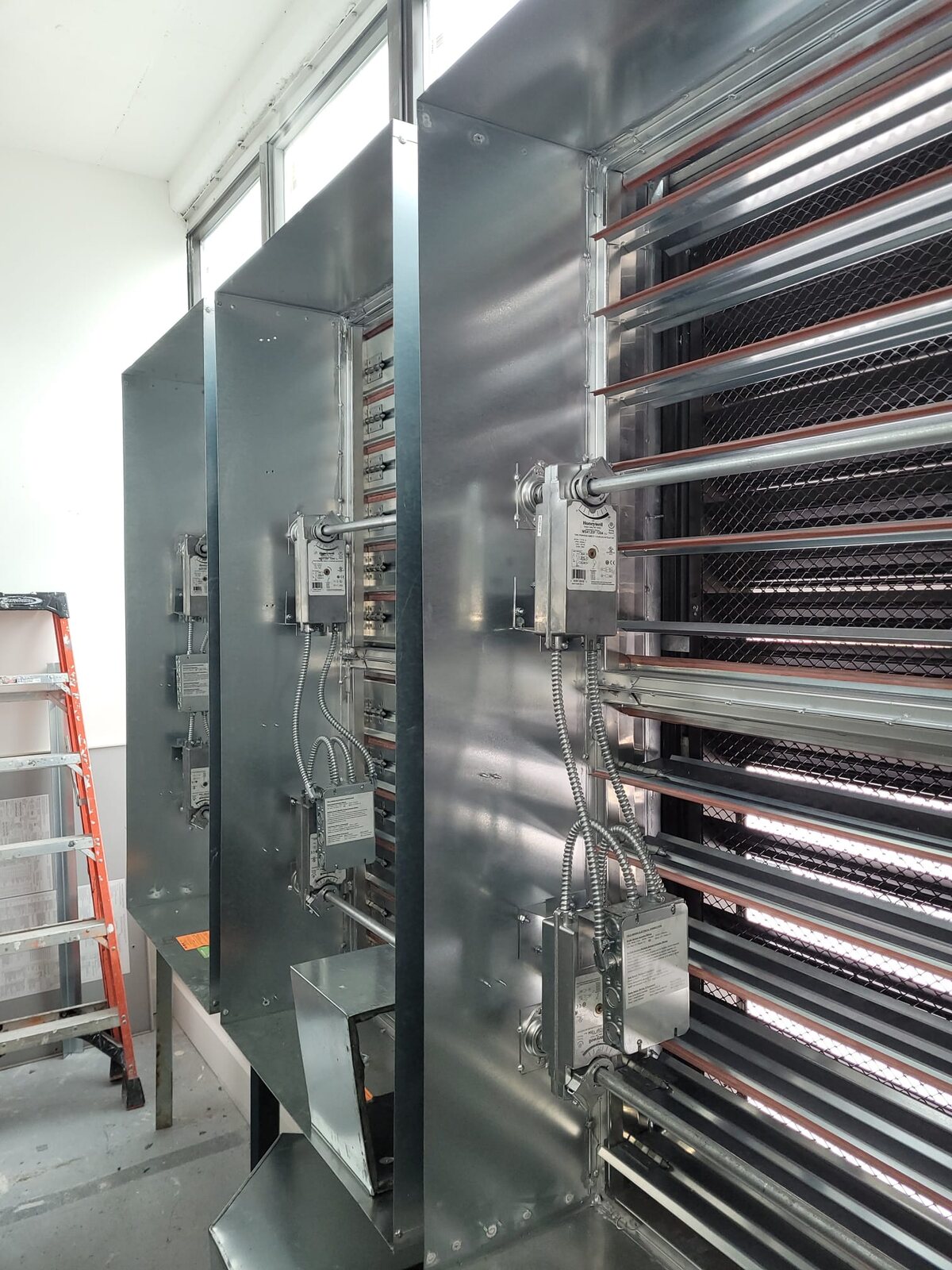 Custom motorized damper louver ventilation system