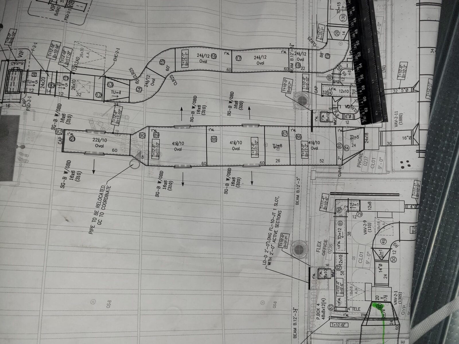 HVAC ductwork plan with measurements and ruler